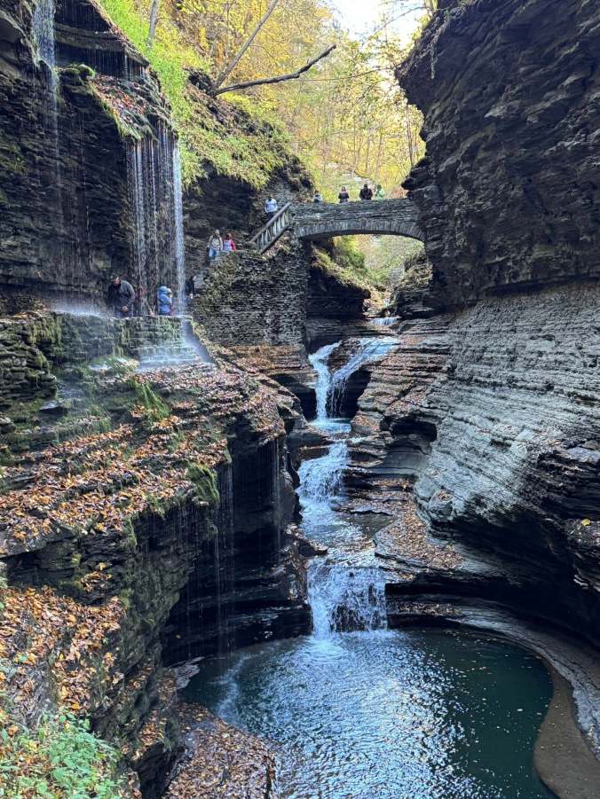 Family exploring the Finger Lakes region in fall