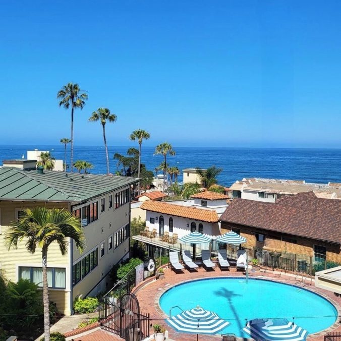 Oceanfront pool at the Grande Colonial hotel overlooking the beach and Pacific Ocean.