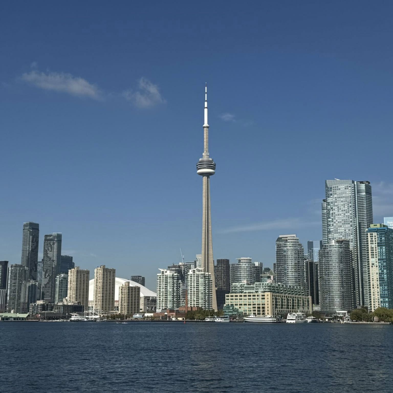 Toronto skyline with CN Tower and waterfront views, family travel destination in Canada