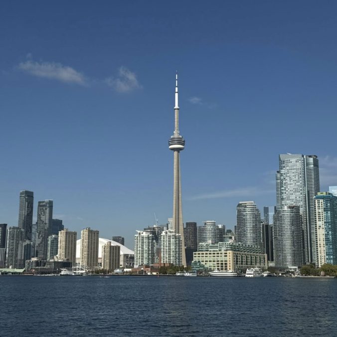 Toronto skyline with CN Tower and waterfront views, family travel destination in Canada