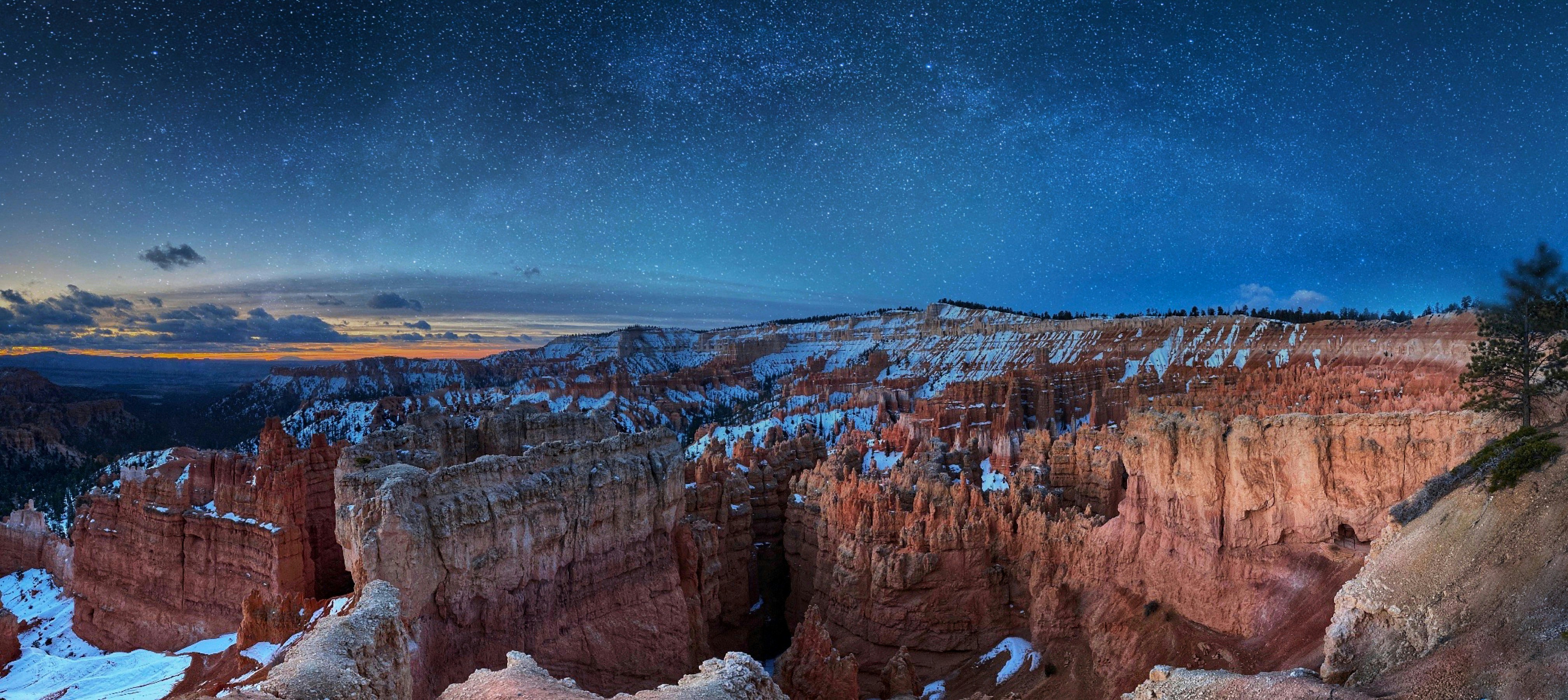 Stars over Bryce Canyon hoodoos at night