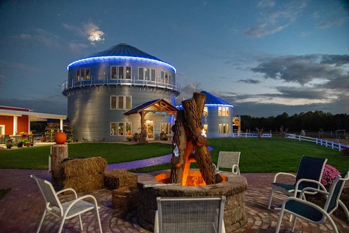 Outdoor Seating at Lake Arvesta Farms Fire pit seating area outside the main building at Lake Arvesta Farms near South Haven, Michigan at dusk.