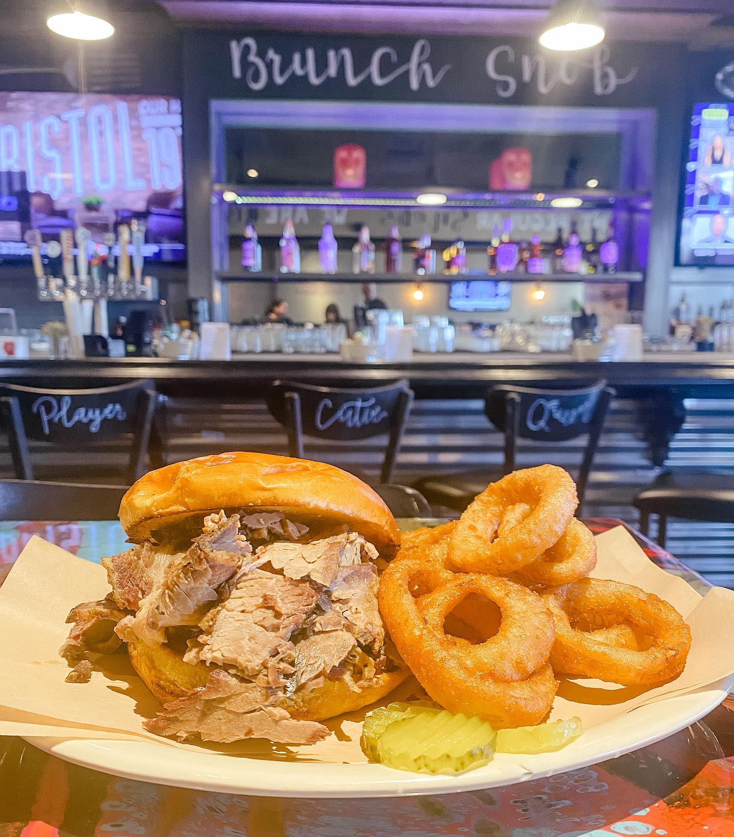 Brisket sandwich and onion rings at The Brunch Snob in Phoenix Arizona