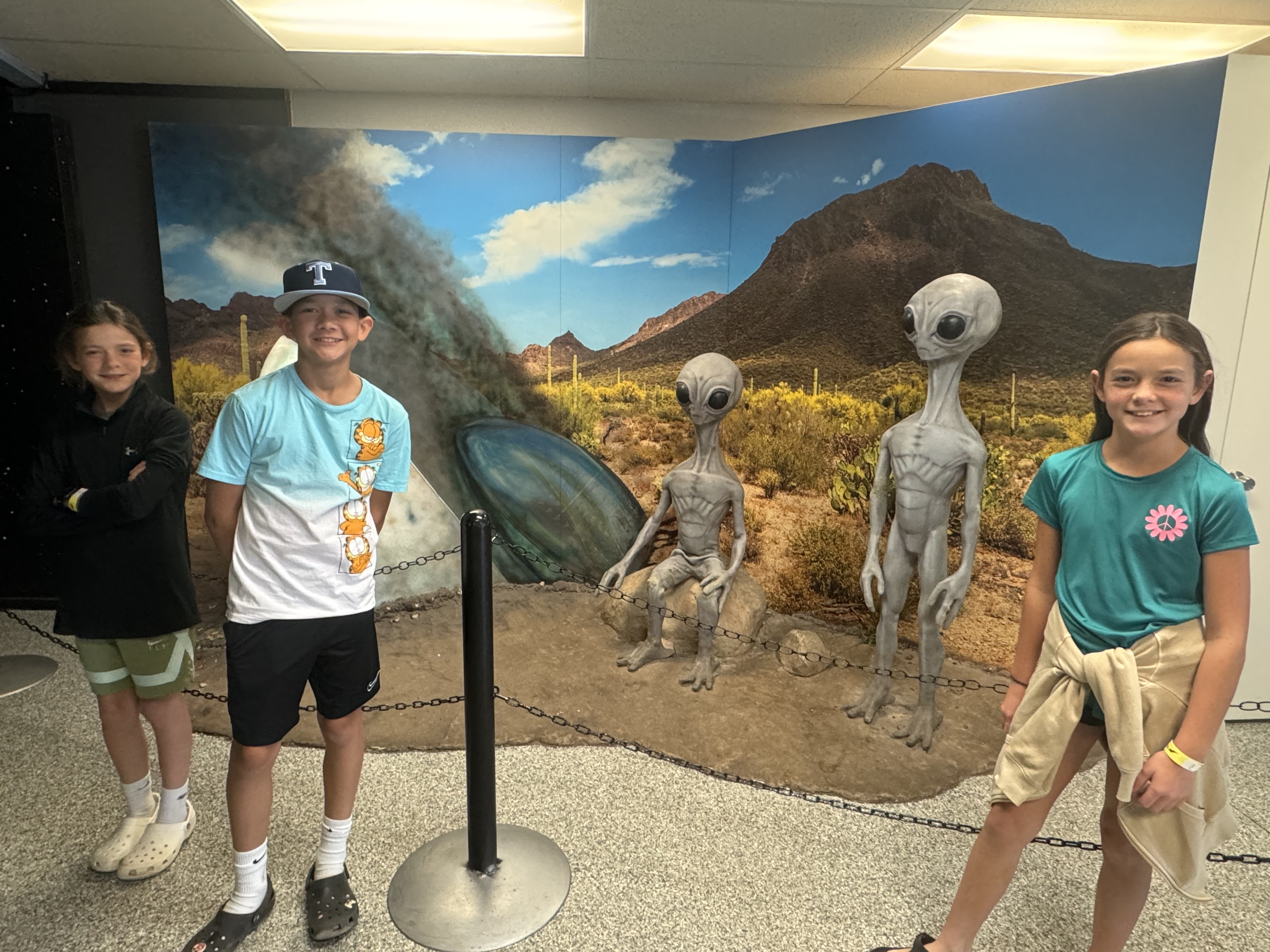 Kids visiting an alien-themed museum display in Roswell New Mexico