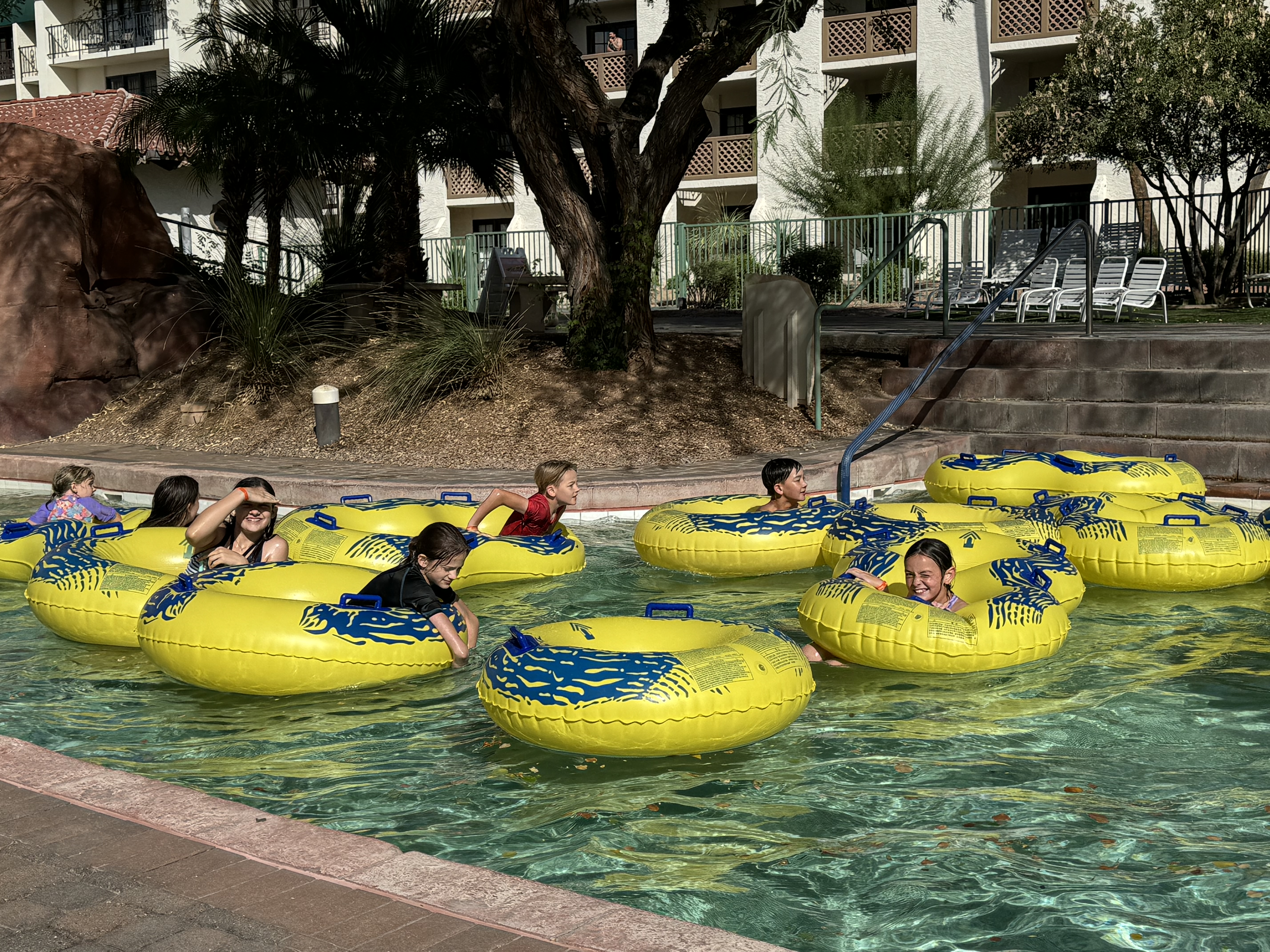 Kids floating in lazy river at Arizona Grand Resort waterpark
