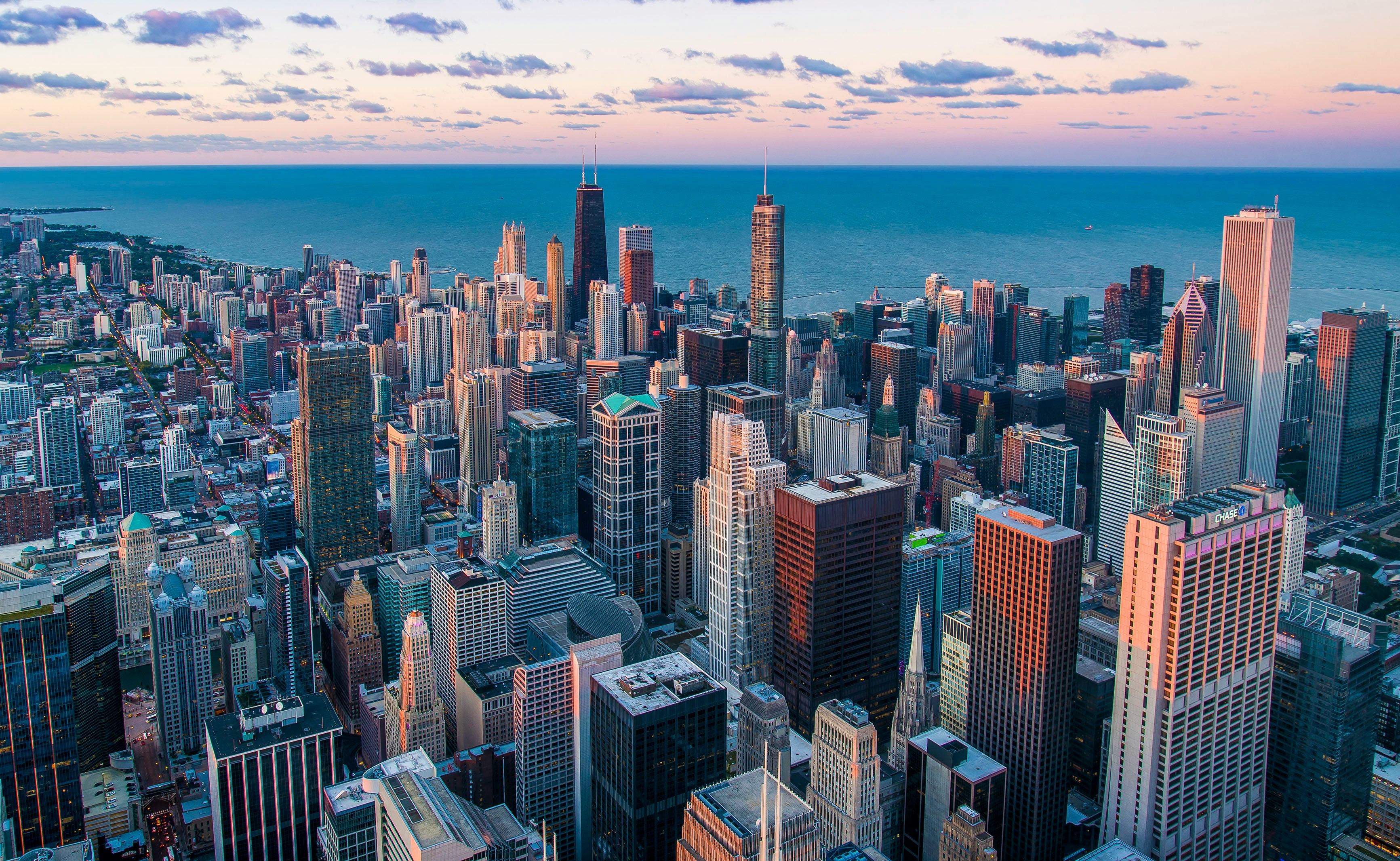 Aerial view of downtown Chicago and Lake Michigan at sunset