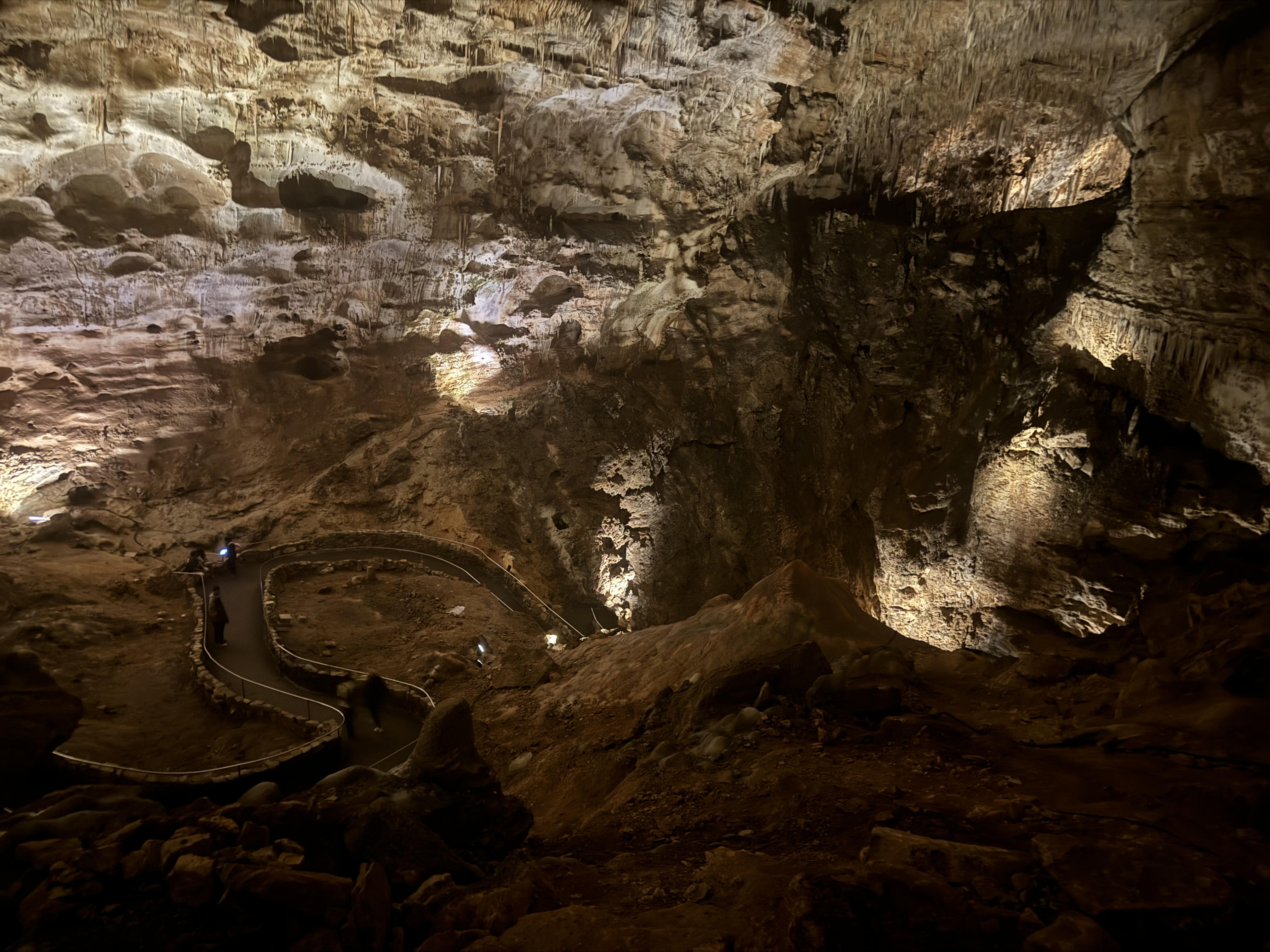 Inside Carlsbad Caverns National Park showing large cave formations and walking path