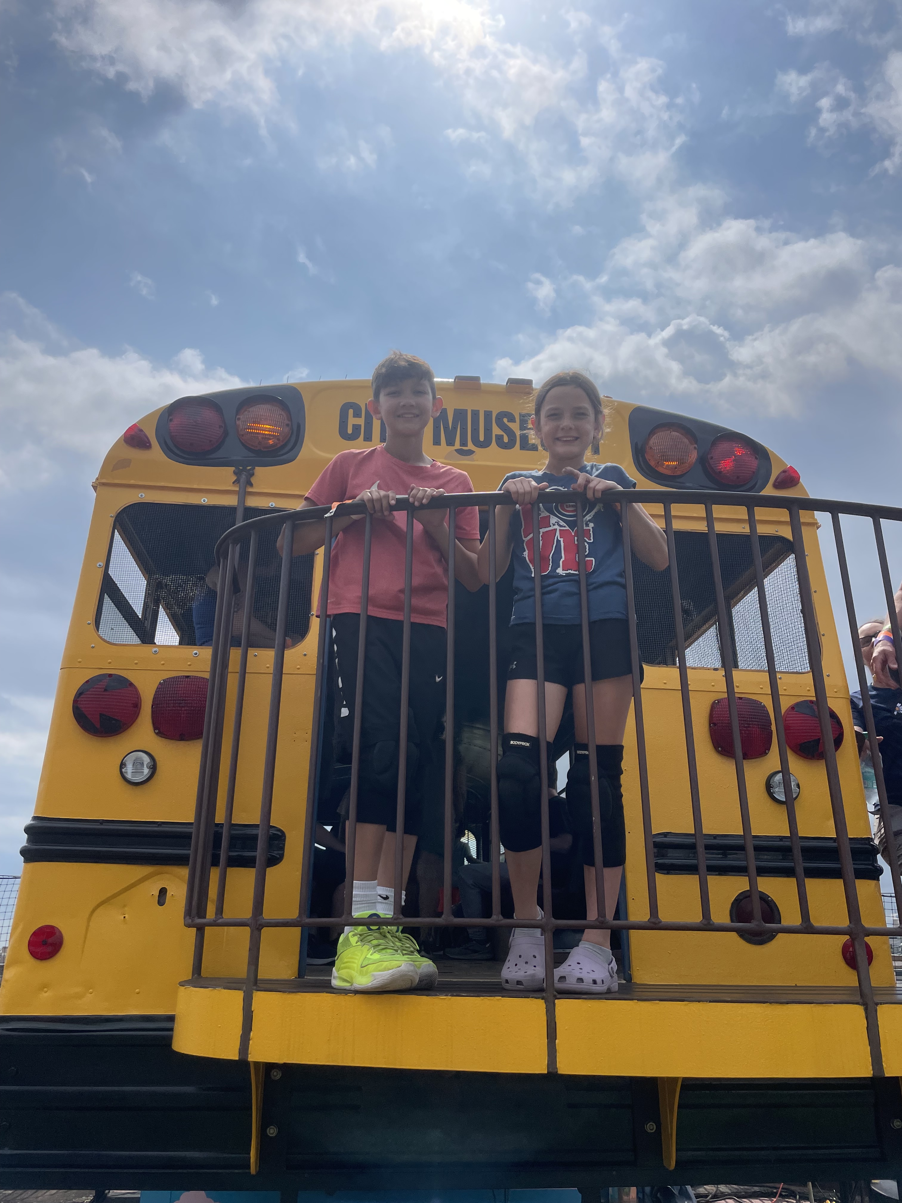 Children standing on the school bus at City Museum in St. Louis Missouri