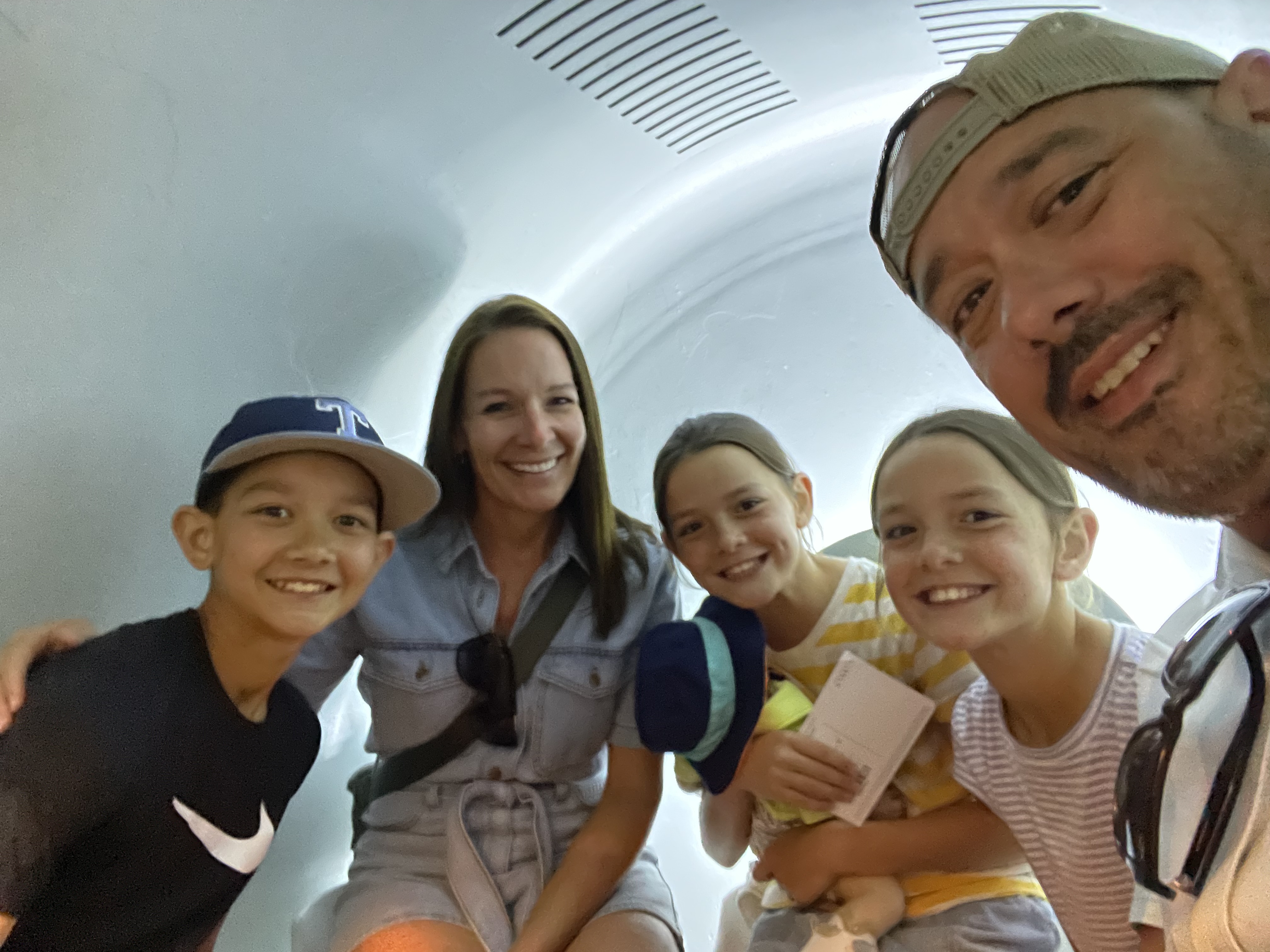 Family riding the tram inside the Gateway Arch in St. Louis Missouri