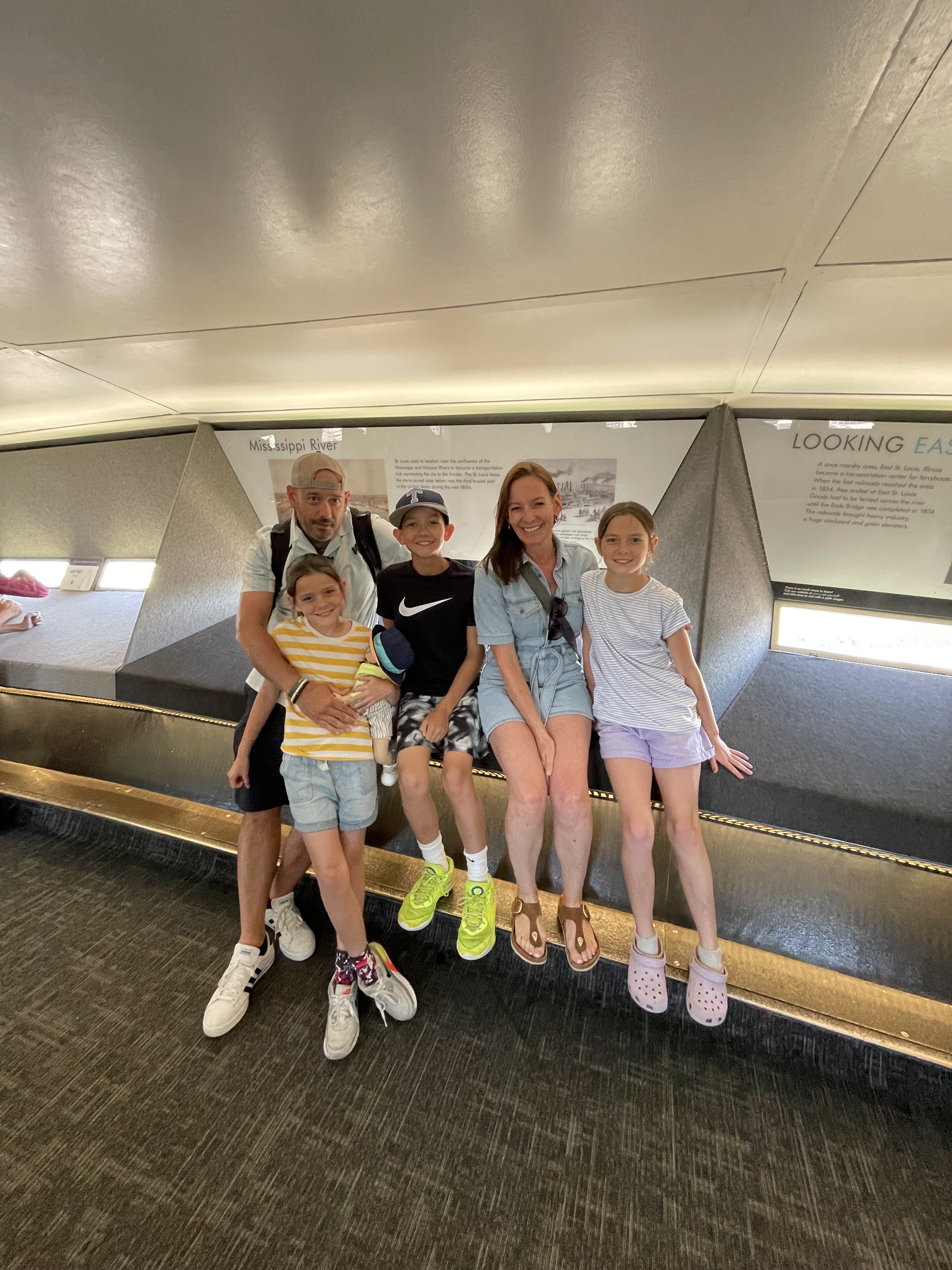 Family at the top of the Gateway Arch observation area in St. Louis Missouri
